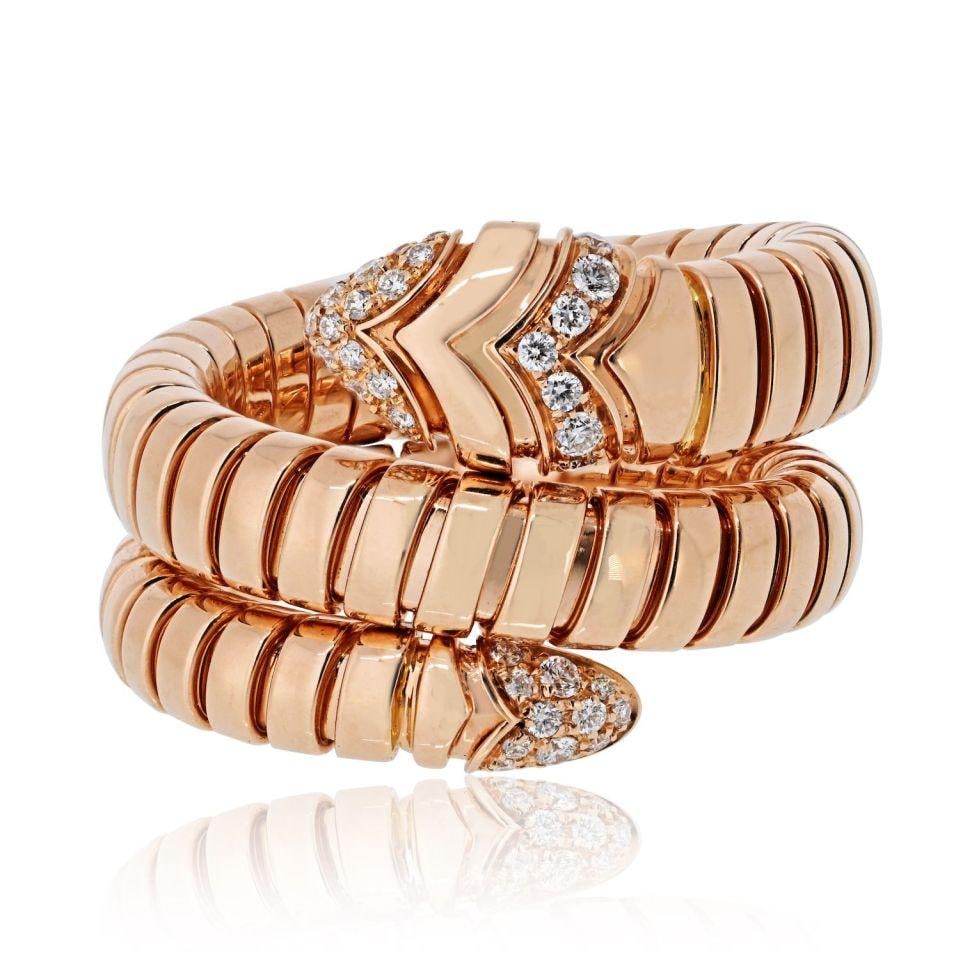 Serpenti Tubogas 18K Rose Gold Diamond Ring by Bvlgari Size L: Serpenti Tubogas 18K Rose Gold Diamond Ring by Bvlgari Size L This Bvlgari Serpenti Tubogas ring is expertly crafted in 18K rose gold and set with sparkling diamonds. Featuring the iconic coiled serpe