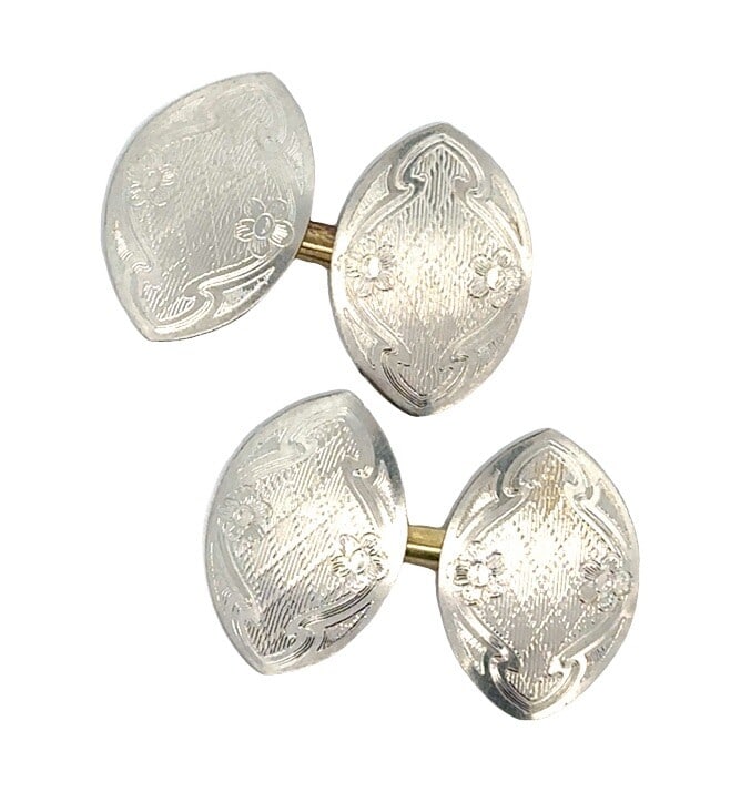 Antique Art Deco Platinum Yellow Gold Floral Cuff Links: Antique Art Deco Platinum Yellow Gold Floral Cuff Links Discover these exquisite Antique Art Deco Men's Cuff Links, meticulously handcrafted with a stunning floral design. Made from a combination of 1