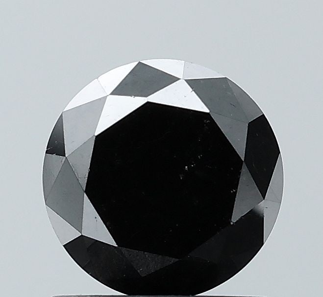 Loose Diamond - ROUND 1.36ct Fancy Black VS1: Loose Diamond - ROUND 1.36ct Fancy Black VS1 Source: Natural Shape: ROUND Carats: 1.36 Color: Fancy Black Certification: NONE Video: