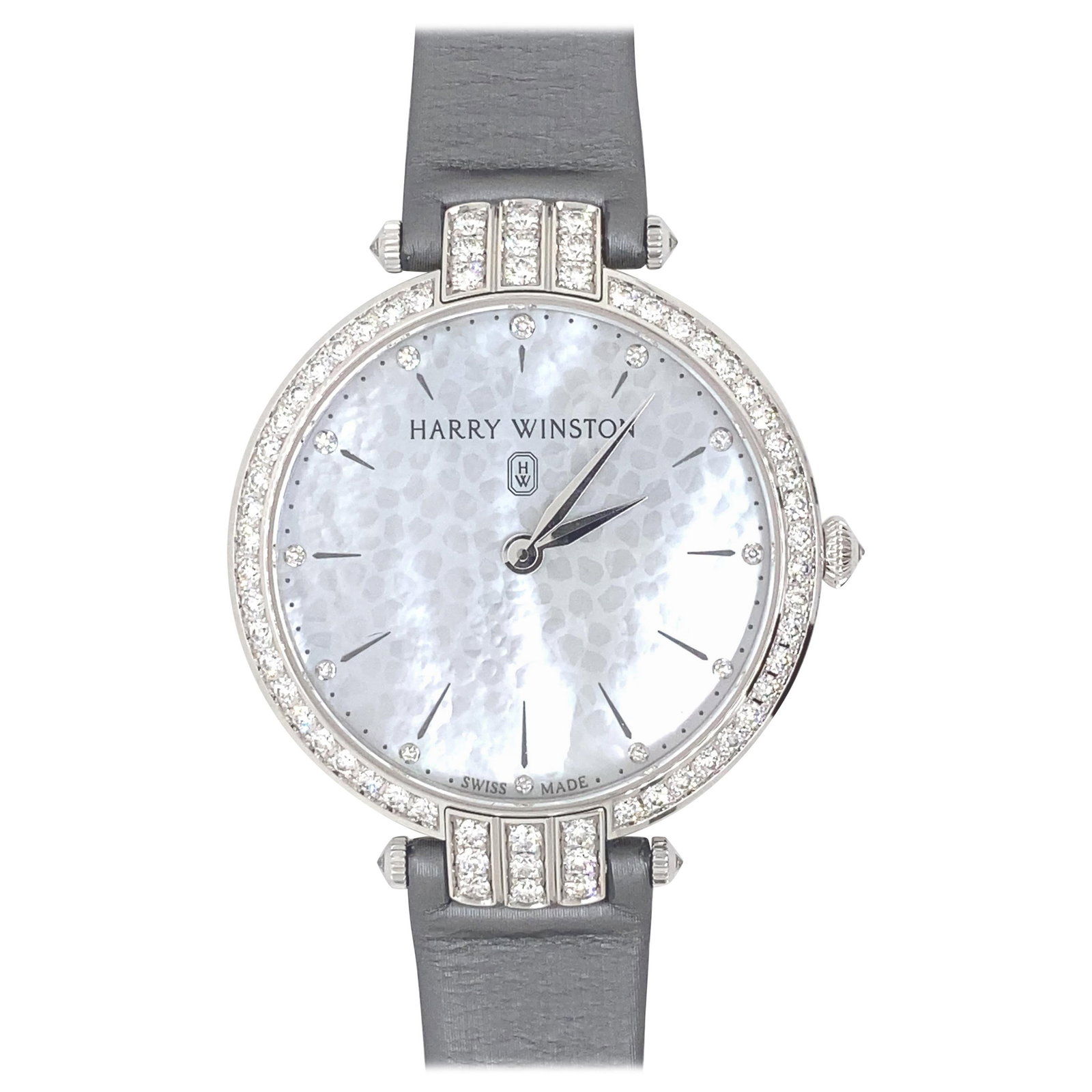 Harry Winston Premier Ladies 18k White Gold Diamond Watch PRNQHM36WW001: Harry Winston Premier Ladies 18k White Gold Diamond Watch PRNQHM36WW001 Experience luxury with the Harry Winston Premier Ladies watch, featuring a stunning 36mm case crafted from 18k white gold adorne