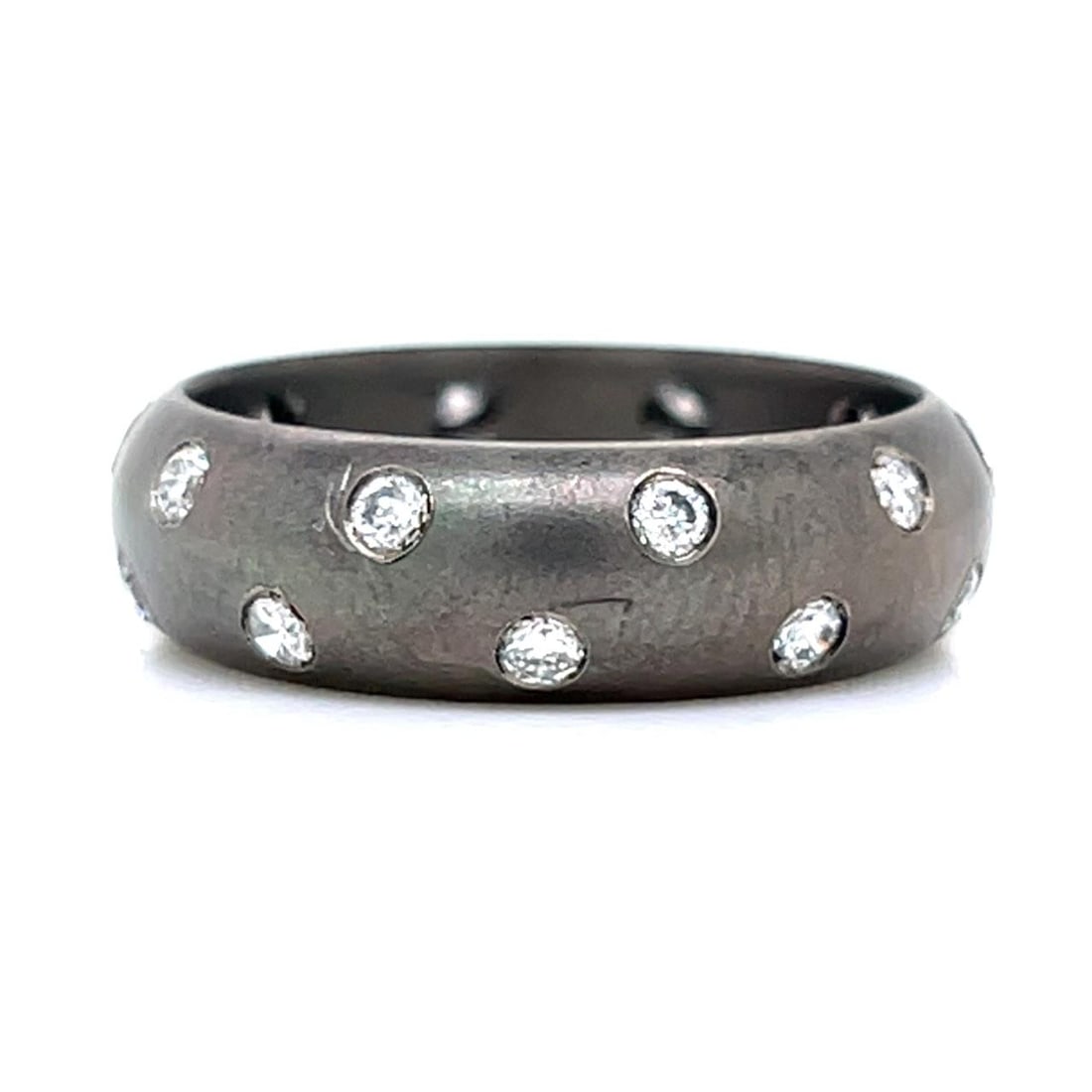 Ring with 1.00 Ct Diamonds in Titanium Size 6.5: Ring with 1.00 Ct Diamonds in Titanium Size 6.5 This pre-owned ring features a titanium band set with 20 diamonds totaling approximately 1.00 carat. The diamonds are G-H color with VS1-SI1 clarity. Th