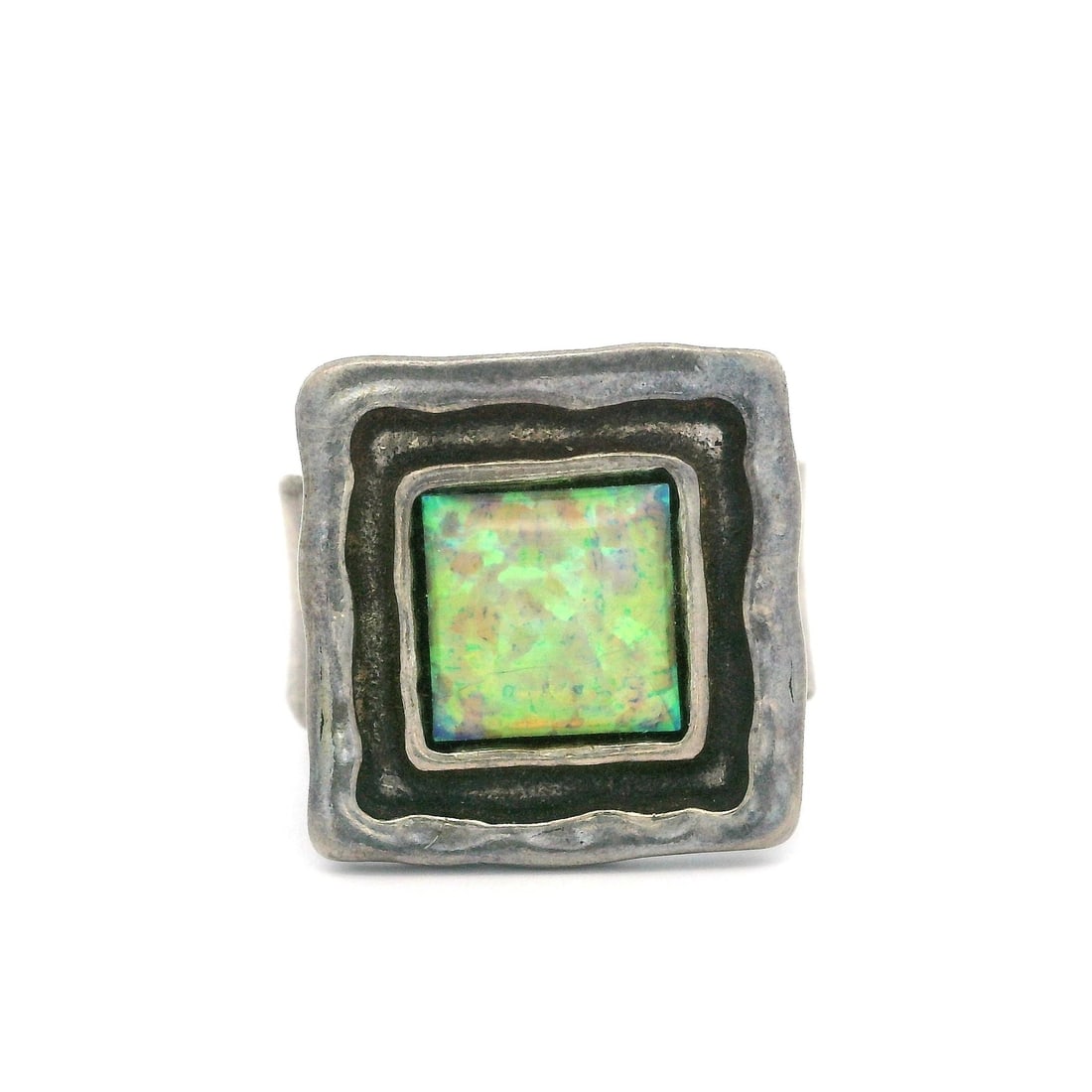 Vintage Sterling Silver Opal Cocktail Ring Square Cabochon: Vintage Sterling Silver Opal Cocktail Ring Square Cabochon This exquisite Vintage Sterling Silver Opal Cocktail Ring features a stunning square platter design with a hammered finish. The centerpiece i