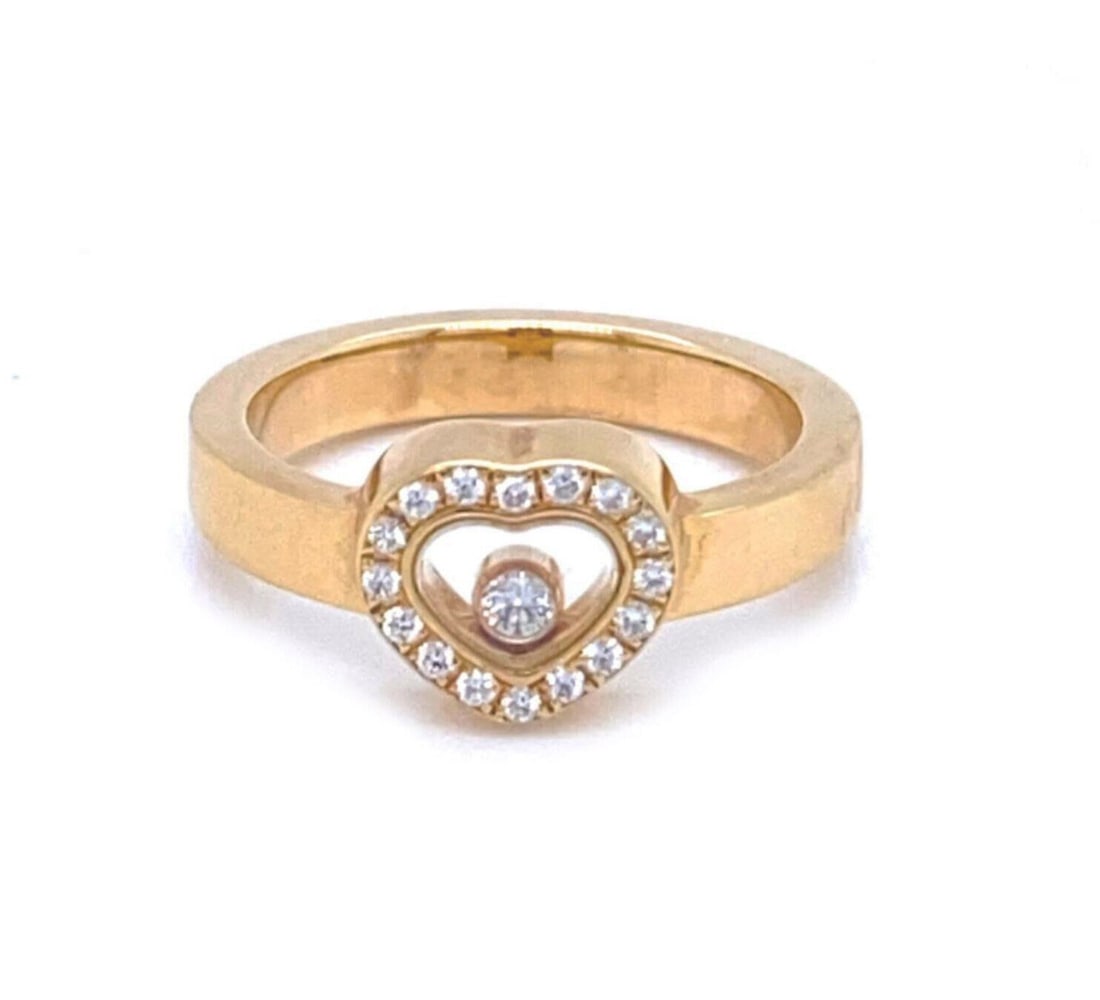 Chopard Happy Diamond Heart Motif 18k Yellow Gold Ring Size 6.5: Chopard Happy Diamond Heart Motif 18k Yellow Gold Ring Size 6.5 This Chopard Happy Diamond ring is crafted from 18k yellow gold and features a heart-shaped bezel set with diamonds. The ring is signed