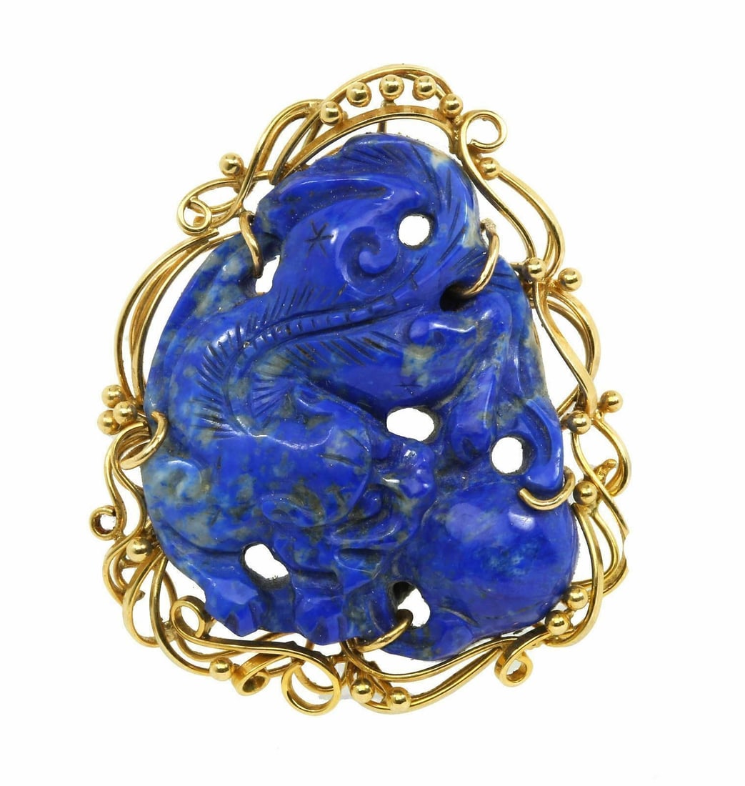 Vintage 14k Yellow Gold Pendant With Lapis Dragon And Ball Design: Vintage 14k Yellow Gold Pendant With Lapis Dragon And Ball Design This vintage charm pendant features a lapis dragon and ball design set in a 14k yellow gold frame. Crafted as an original piece, it is