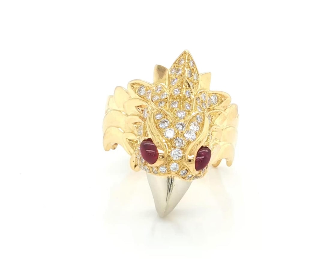 Eagle Motif 18k Two Tone Gold Ring with Diamond and Ruby Accents Size 9: Eagle Motif 18k Two Tone Gold Ring with Diamond and Ruby Accents Size 9 This striking Diamond and Ruby Eagle Ring is finely crafted in 18k yellow and white gold, featuring a bold eagle motif that symb