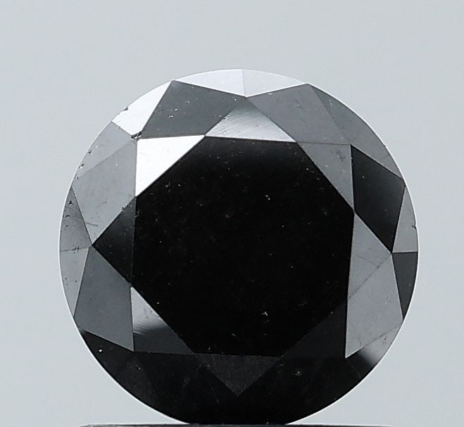 Loose Diamond - ROUND 1.43ct Fancy Black VVS2: Loose Diamond - ROUND 1.43ct Fancy Black VVS2 Source: Natural Shape: ROUND Carats: 1.43 Color: Fancy Black Certification: NONE Video: