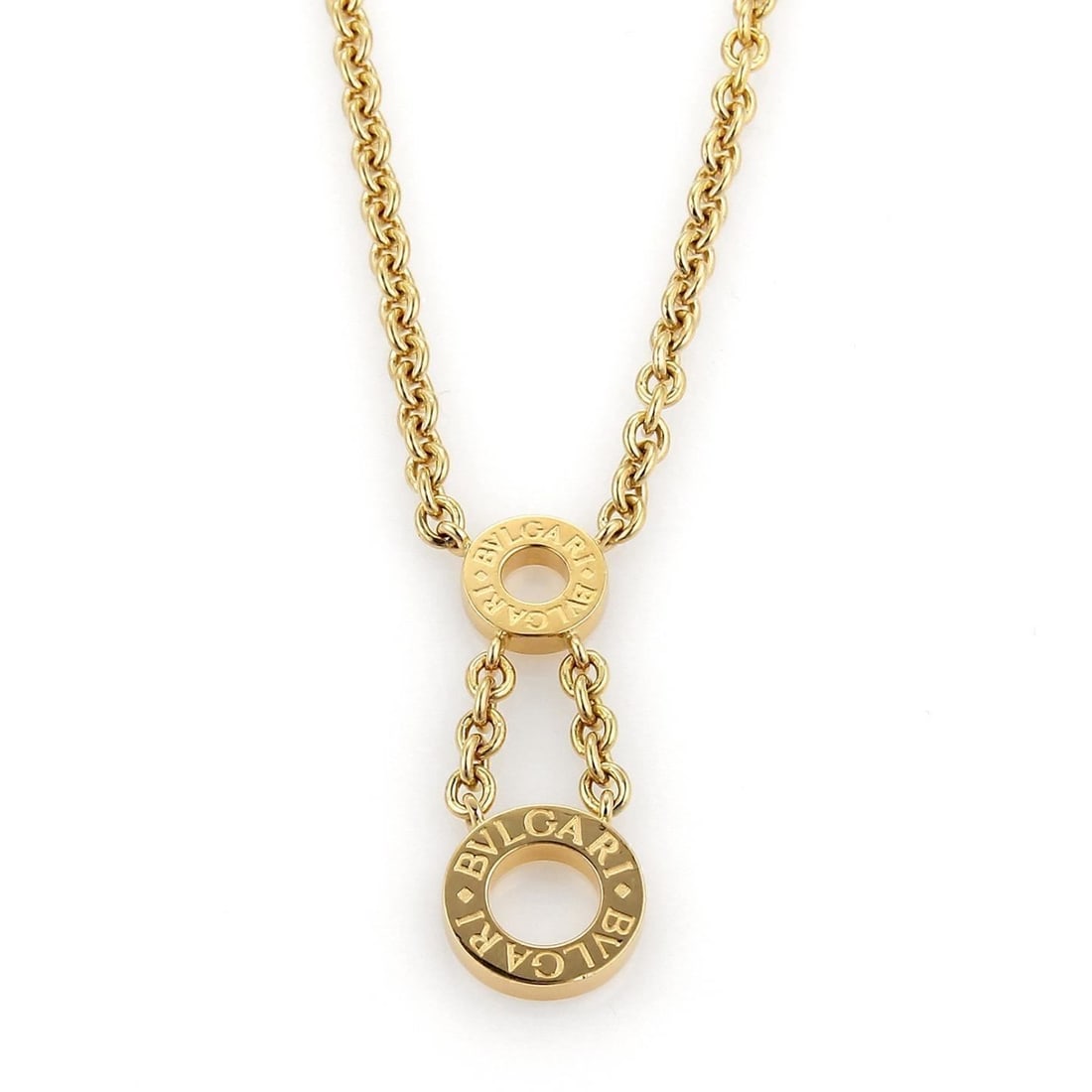 Bvlgari Double Circle 18k Yellow Gold Pendant Necklace from Italy: Bvlgari Double Circle 18k Yellow Gold Pendant Necklace from Italy This authentic Bvlgari double circle pendant necklace is crafted from solid 18k yellow gold, featuring two interlocking open circles t