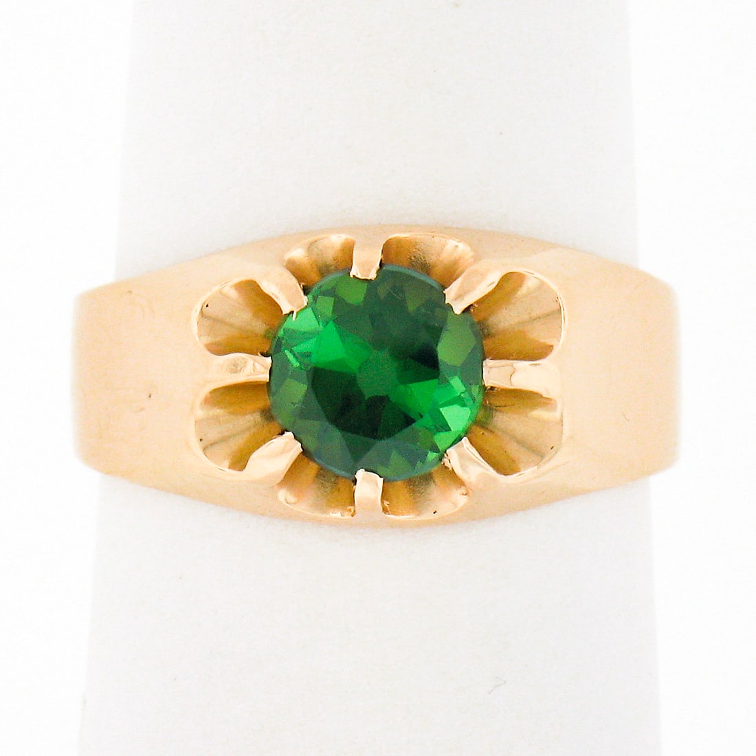 Vintage 14k Yellow Gold 0.85ct Green Tourmaline Solitaire Ring: Vintage 14k Yellow Gold 0.85ct Green Tourmaline Solitaire Ring This exquisite vintage unisex ring is crafted in solid 14k yellow gold and features a stunning round brilliant cut green tourmaline at it
