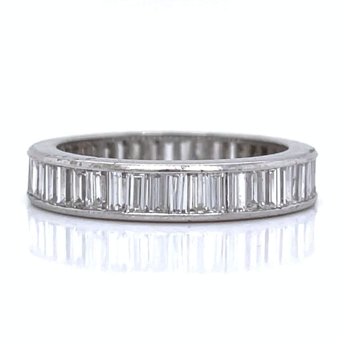 Art Deco Platinum Eternity Band 3.60 Ct Baguette Diamonds: Art Deco Platinum Eternity Band 3.60 Ct Baguette Diamonds This exquisite Art Deco Eternity Band is crafted in platinum and features a stunning array of 45 baguette diamonds, totaling approximately 3.6
