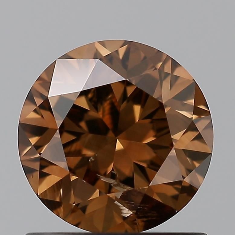 Loose Diamond - ROUND 0.83ct Brown SI2: Loose Diamond - ROUND 0.83ct Brown SI2 Source: Natural Shape: ROUND Carats: 0.83 Color: Brown Certification: NONE Video: