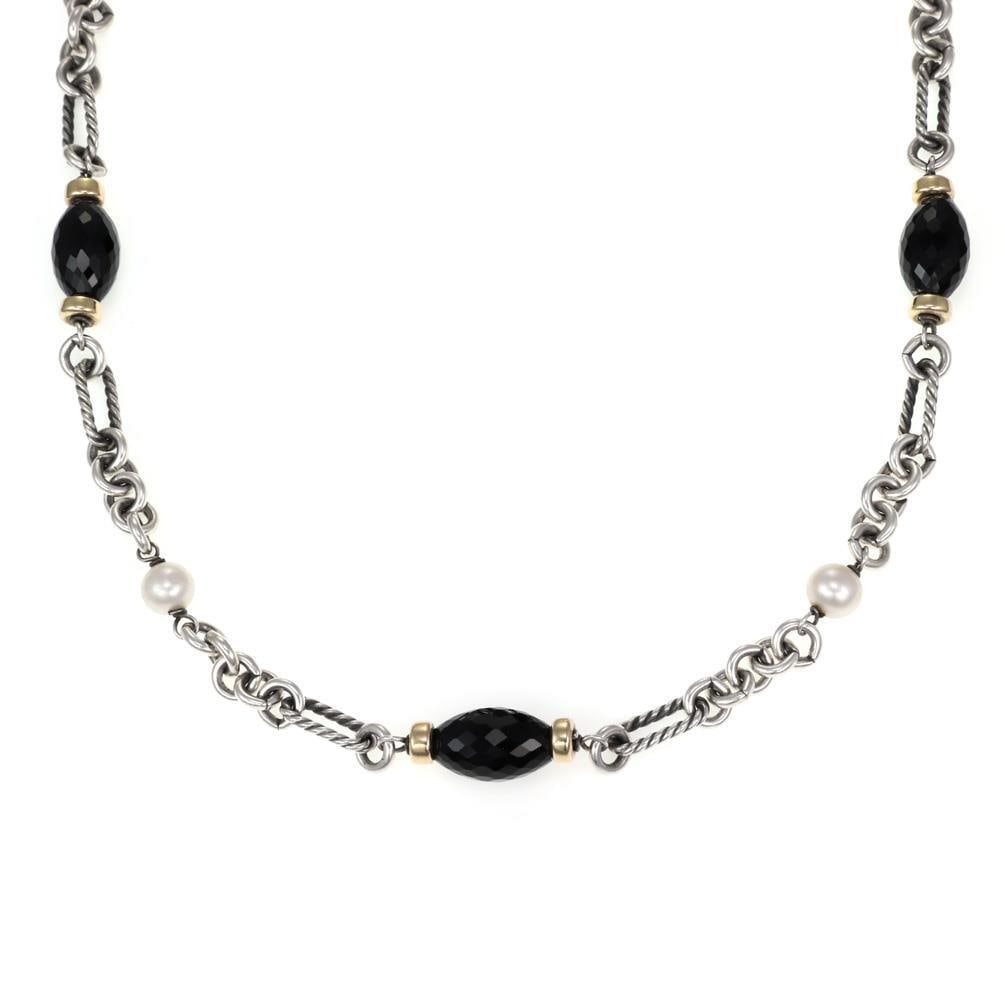 David Yurman 36 Inch Onyx Pearl Necklace Sterling Silver 18k Gold Toggle Clasp: David Yurman 36 Inch Onyx Pearl Necklace Sterling Silver 18k Gold Toggle Clasp This exquisite necklace, crafted by David Yurman, showcases a stunning combination of sterling silver and 18k yellow gold