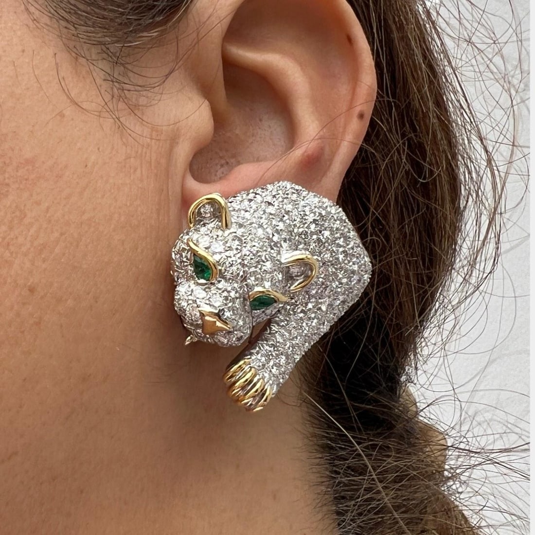 Emerald and Diamond Earrings in 18K Gold and Platinum by David Webb: Emerald and Diamond Earrings in 18K Gold and Platinum by David Webb These David Webb earrings are crafted from 18K gold and platinum, featuring four emeralds totaling approximately 0.60 carats and abo