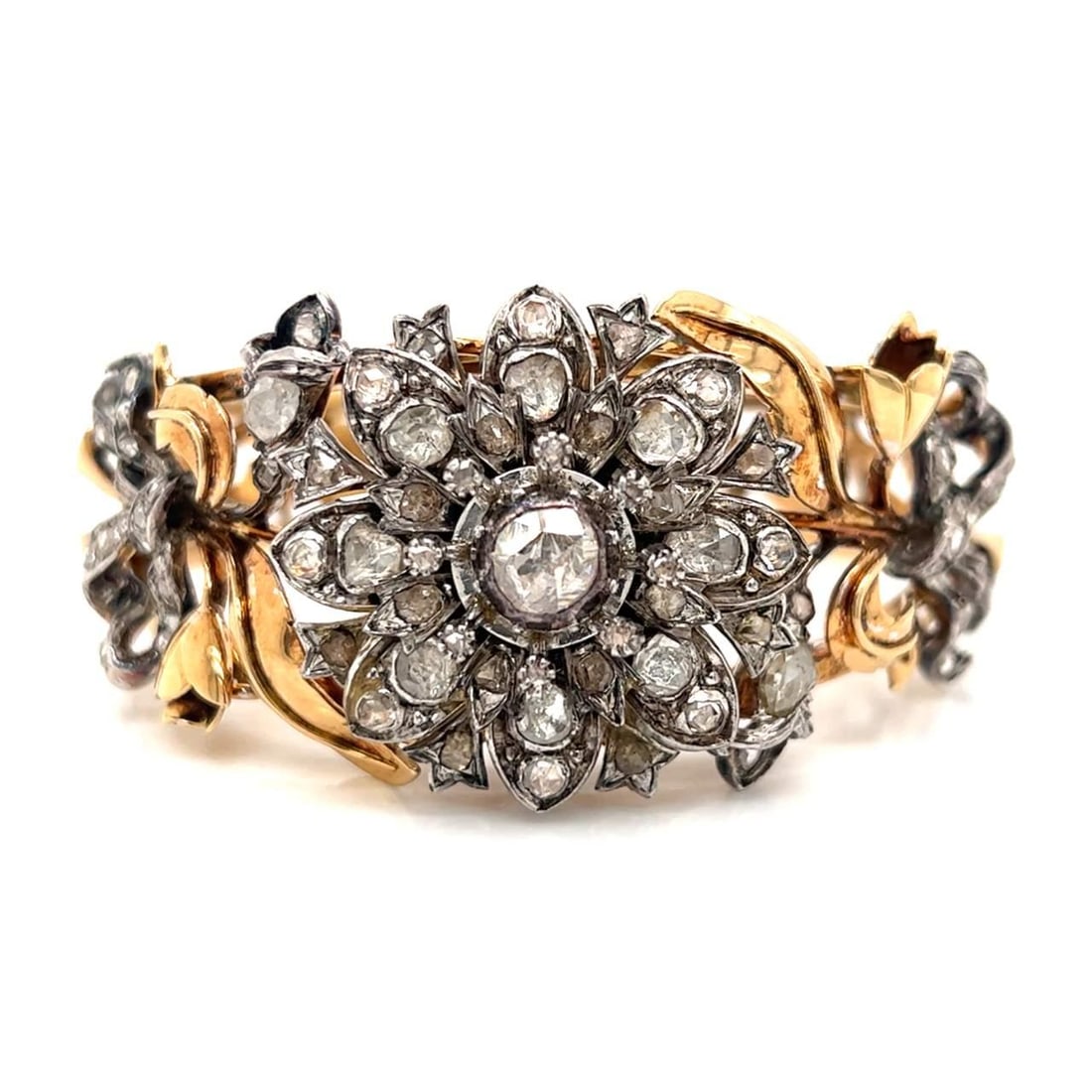 Vintage 18K Rose Gold Silver Top Diamond Bangle 6.50 Ct: Vintage 18K Rose Gold Silver Top Diamond Bangle 6.50 Ct This exquisite Antique Bangle features a stunning combination of 18K rose gold and silver, elegantly adorned with approximately 6.50 carats of r