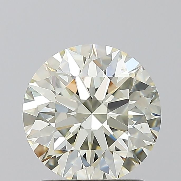 Loose Diamond - ROUND 1.5ct O-P SI1: Loose Diamond - ROUND 1.5ct O-P SI1 Source: Natural Shape: ROUND Carats: 1.5 Color: O-P Certification: GIA Video: