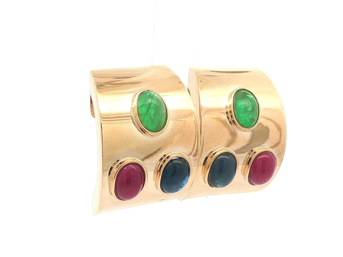 Wide 14k Yellow Gold Clip On Cuff Earrings With Ruby Emerald Sapphire Cabochons: Wide 14k Yellow Gold Clip On Cuff Earrings With Ruby Emerald Sapphire Cabochons These wide cuff clip-on earrings are crafted from solid 14k yellow gold and feature natural cabochon-cut rubies, emerald
