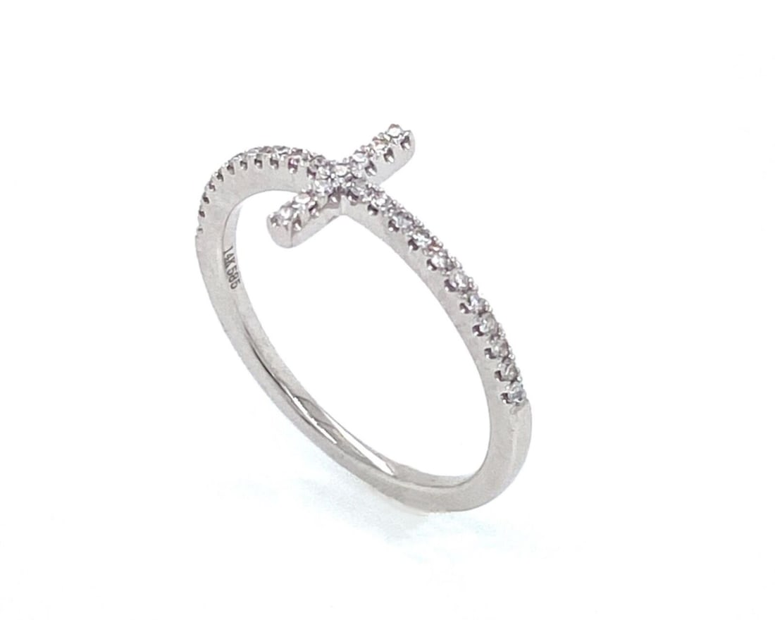 14k White Gold East West Diamond Cross Motif Ring Size 6: 14k White Gold East West Diamond Cross Motif Ring Size 6 This East West Diamond Cross ring is crafted in solid 14k white gold, featuring a horizontally set cross motif adorned with delicate diamond ac