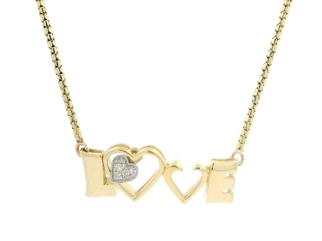 14k Yellow Gold 0.07ct Diamond Heart Pendant Necklace 18": 14k Yellow Gold 0.07ct Diamond Heart Pendant Necklace 18" This exquisite necklace features a heart-shaped pendant adorned with five brilliant cut natural diamonds, totaling approximately 0.07 carats.