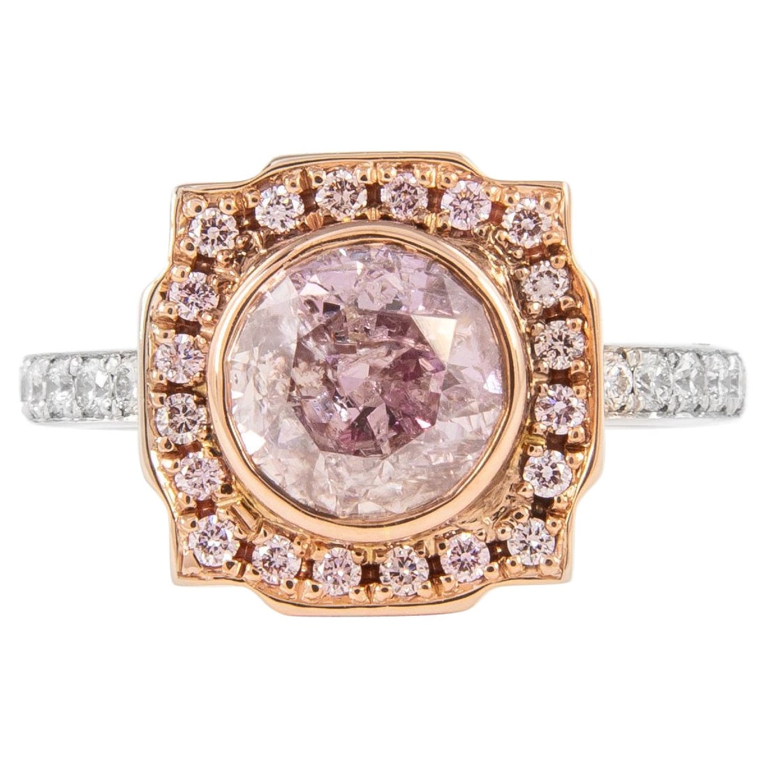 GIA Certified 1.86ct Pink Diamond Ring 18k Gold: GIA Certified 1.86ct Pink Diamond Ring 18k Gold This exquisite ring features a stunning 1.86ct round brilliant pink diamond, certified by GIA, showcasing a Fancy Purplish Pink color. The design is com