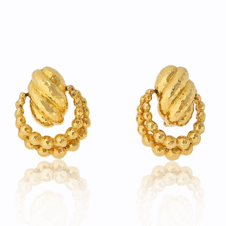 David Webb 18K Yellow Gold Hammered Door Knocker Earrings: David Webb 18K Yellow Gold Hammered Door Knocker Earrings These exquisite David Webb door knocker earrings are crafted from a combination of luxurious platinum and 18K yellow gold, weighing 38.3 grams