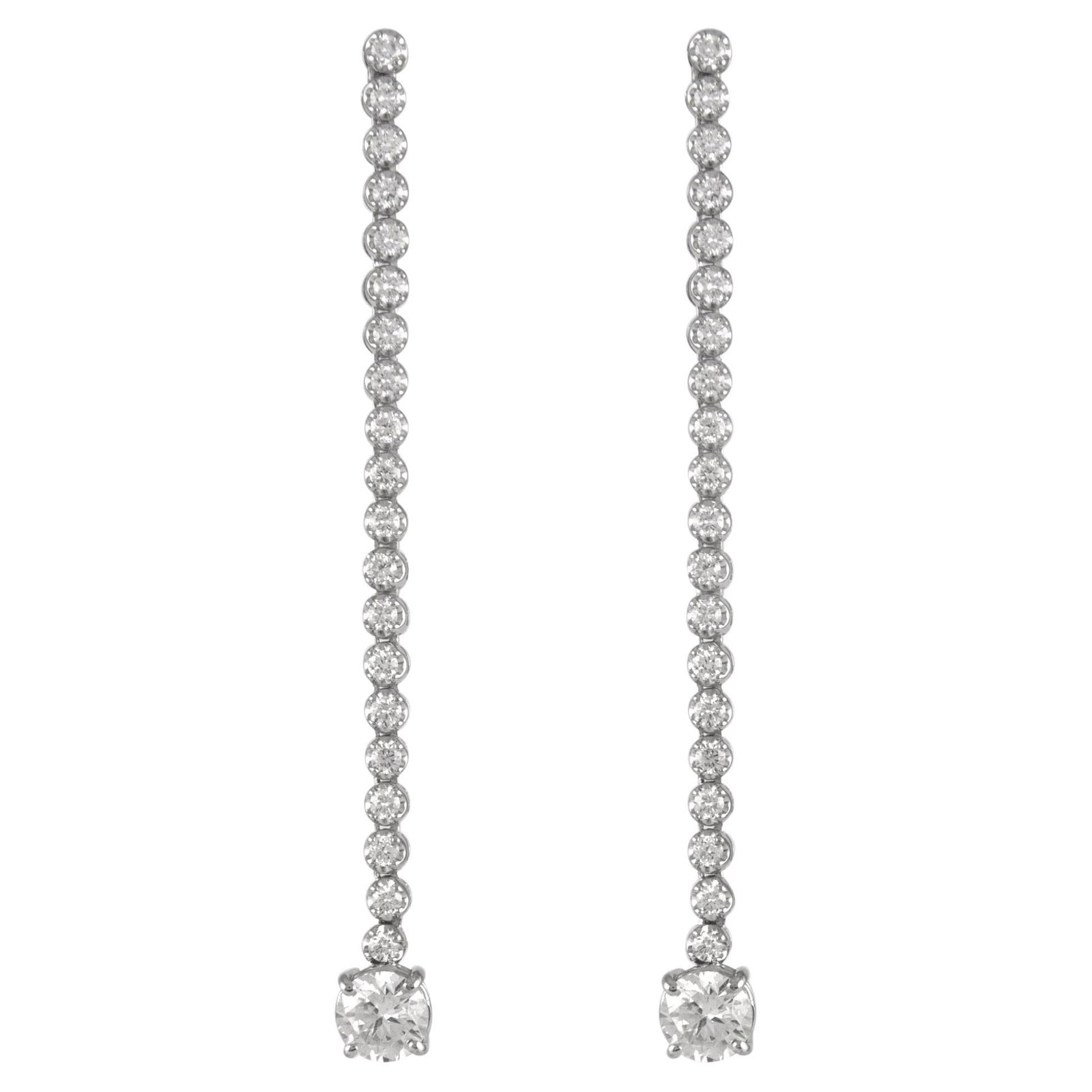 3.70ct Diamond Drop Earrings 18k White Gold EGL Certified: 3.70ct Diamond Drop Earrings 18k White Gold EGL Certified Discover these exquisite Drop Earrings featuring a total diamond weight of 3.70ct set in luxurious 18k white gold. The earrings showcase two s