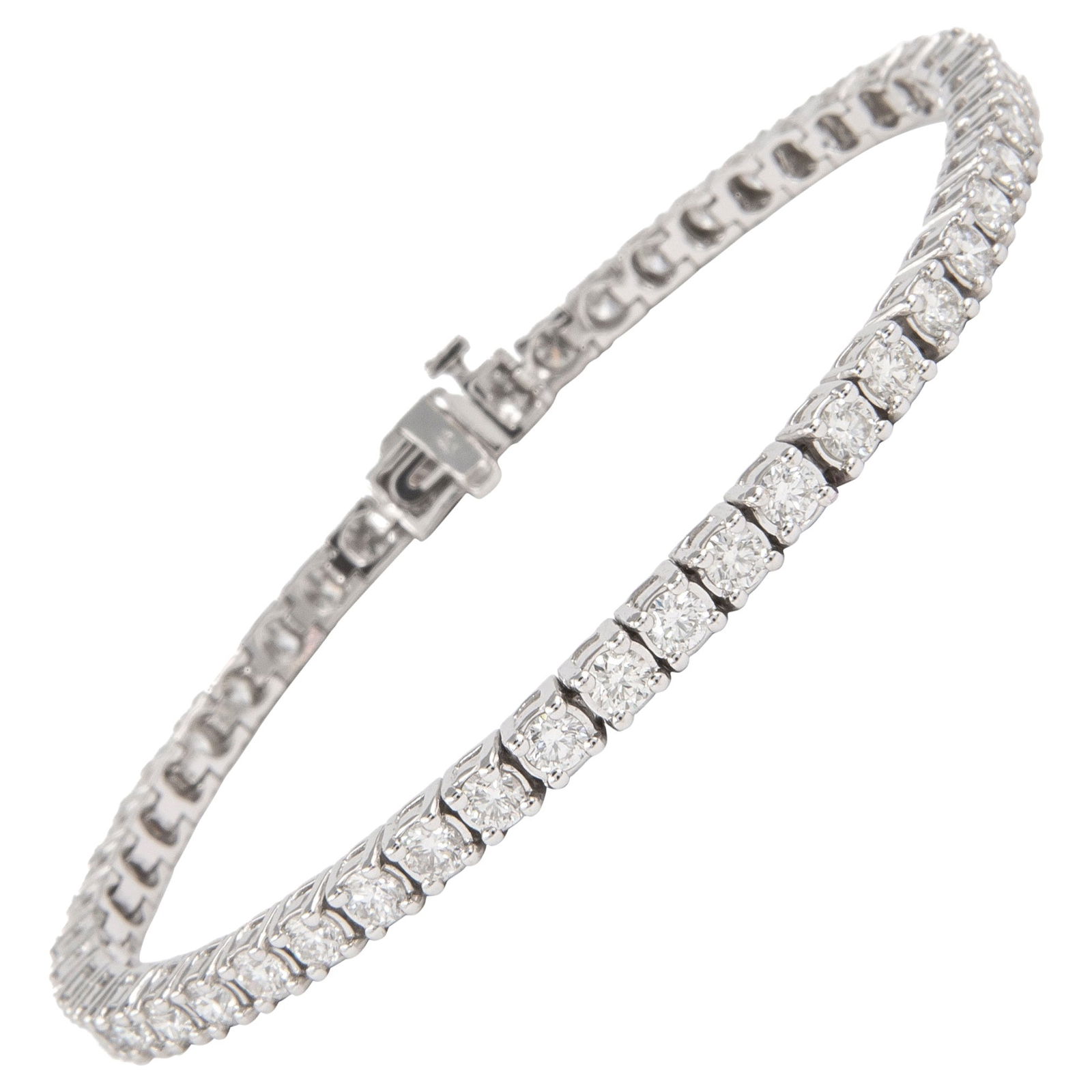 Diamond Tennis Bracelet 4.39 Carat 18k White Gold Modern Design: Diamond Tennis Bracelet 4.39 Carat 18k White Gold Modern Design This exquisite tennis bracelet features 49 round brilliant diamonds totaling 4.39 carats, with approximately H/I color and VVS2/VS1 clar