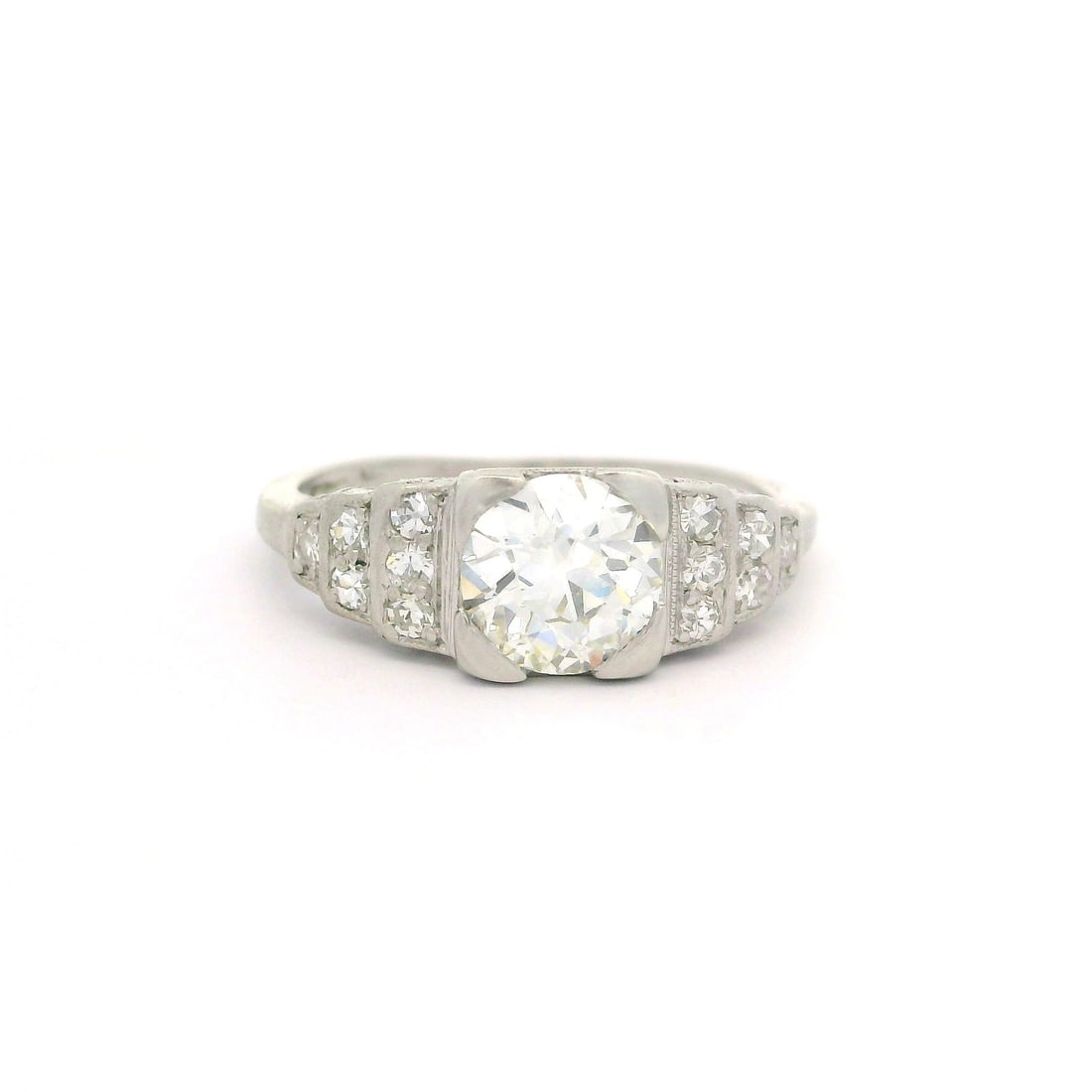 Antique Art Deco Platinum Engagement Ring GIA 0.92ct Diamonds: Antique Art Deco Platinum Engagement Ring GIA 0.92ct Diamonds This exquisite Antique Art Deco engagement ring showcases a stunning design crafted in solid .900 platinum, weighing 2.52 grams. At its ce