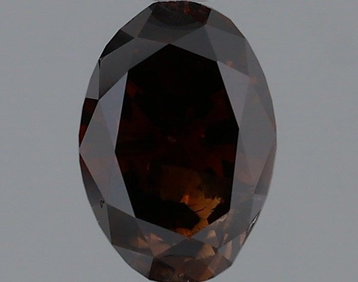 Loose Diamond - OVAL 0.73ct Fancy Dark Orangey Brown: Loose Diamond - OVAL 0.73ct Fancy Dark Orangey Brown Source: Natural Shape: OVAL Carats: 0.73 Color: Fancy Dark Orangey Brown Certification: GIA Video: