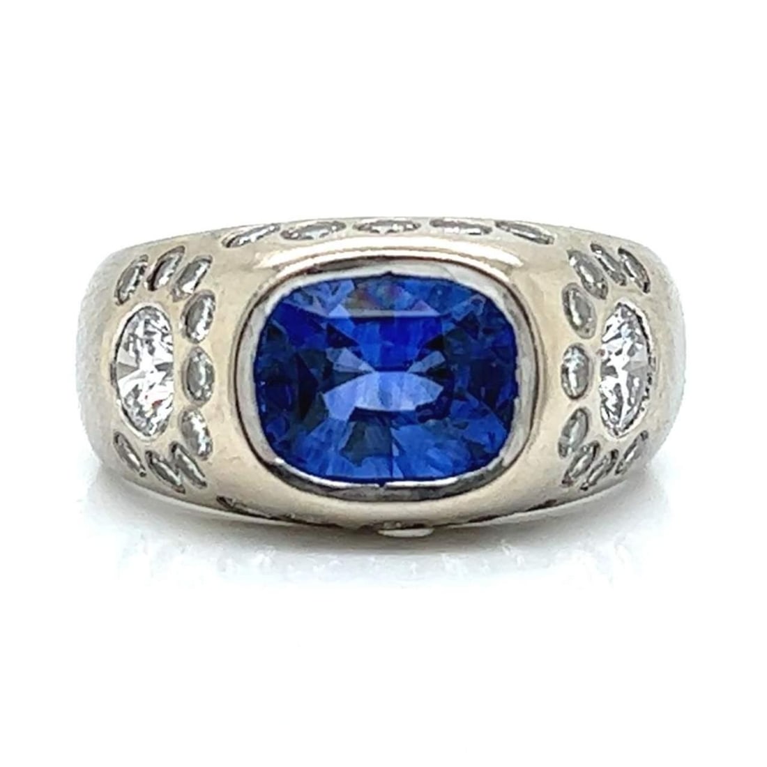 18K White Gold GIA Certified 3.70 Ct Sapphire Diamond Ring: 18K White Gold GIA Certified 3.70 Ct Sapphire Diamond Ring This stunning 18K White Gold ring features a remarkable GIA Certified 3.70 Ct. Sapphire at its center, complemented by two exquisite GIA Cert