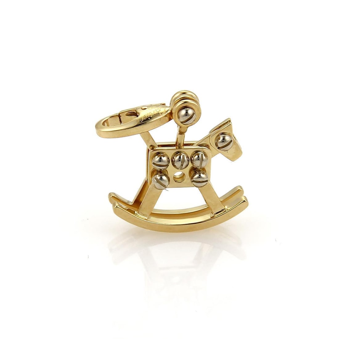 Cartier 18k Two Tone Gold Rocking Horse Charm Pendant: Cartier 18k Two Tone Gold Rocking Horse Charm Pendant Introducing a distinctive collectible charm pendant from Cartier, expertly crafted in 18k yellow gold with elegant white gold accents. This charmi
