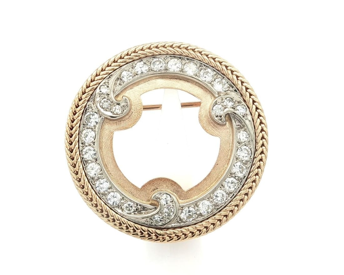Vintage 1.56ctw Diamond Waves Brooch in Solid Gold: Vintage 1.56ctw Diamond Waves Brooch in Solid Gold This exquisite vintage brooch pin features a stunning open circle design with waves, crafted from solid yellow gold and accented by a white gold cent