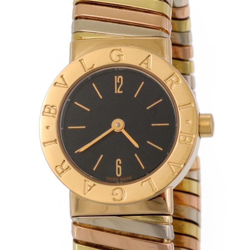 Bvlgari 18k Tricolor Gold Tubogas Cuff Quartz Watch: Bvlgari 18k Tricolor Gold Tubogas Cuff Quartz Watch Experience the elegance of this authentic Bvlgari wristwatch, beautifully crafted from 18k tricolor gold, featuring yellow, rose, and white gold wit