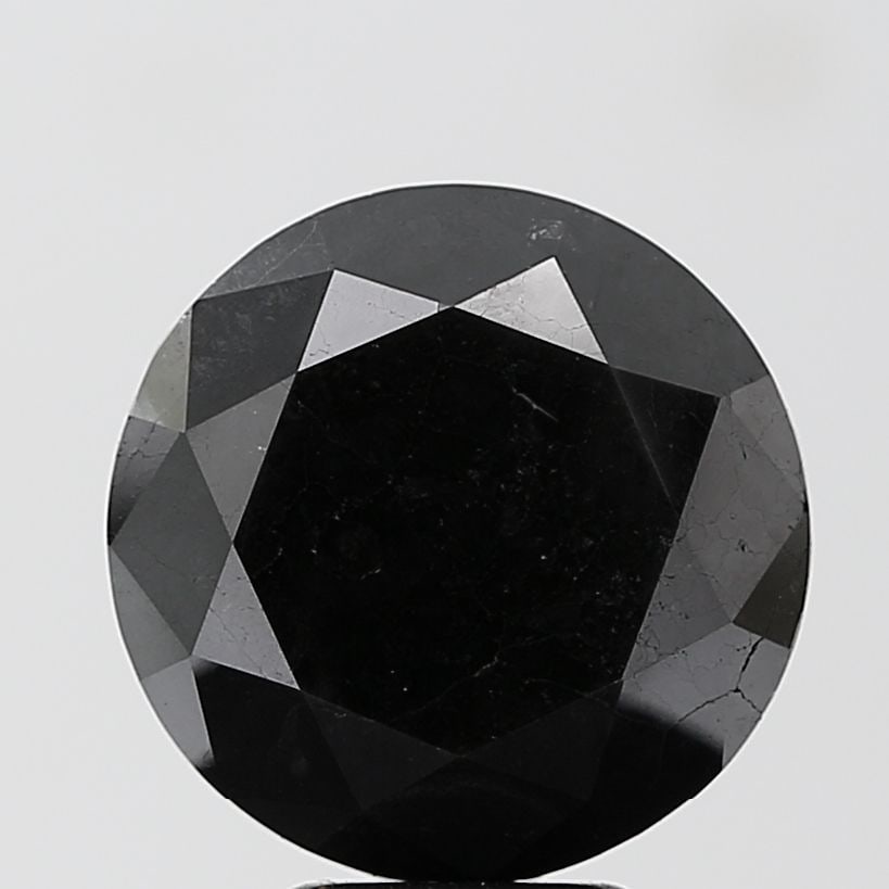 Loose Diamond - ROUND 6.95ct Black VS2: Loose Diamond - ROUND 6.95ct Black VS2 Source: Natural Shape: ROUND Carats: 6.95 Color: Black Certification: NONE Video: