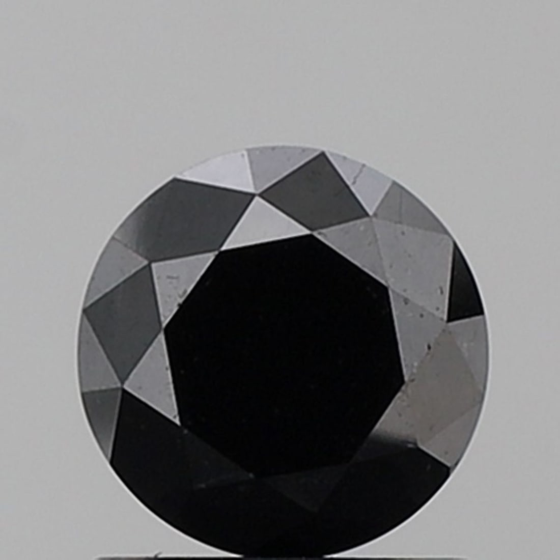 Loose Diamond - ROUND 1.13ct Fancy Black VVS2: Loose Diamond - ROUND 1.13ct Fancy Black VVS2 Source: Natural Shape: ROUND Carats: 1.13 Color: Fancy Black Certification: NONE Video:
