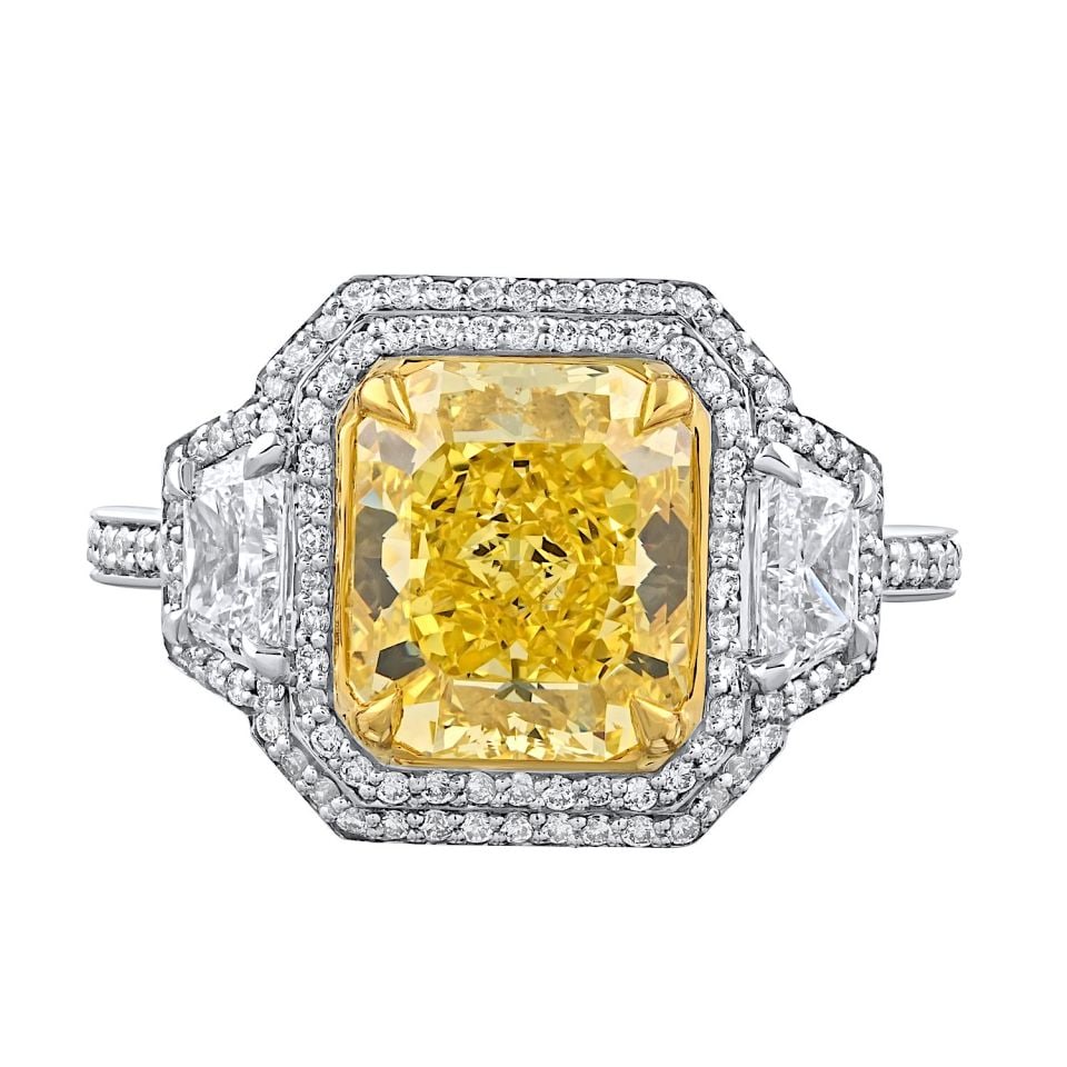 3.26 Carat GIA Fancy Vivid Yellow Diamond Ring Platinum 18K Gold: 3.26 Carat GIA Fancy Vivid Yellow Diamond Ring Platinum 18K Gold This stunning Fancy Yellow Ring features a GIA-certified 3.26-carat Fancy Vivid Yellow radiant cut diamond, showcasing an Even color di