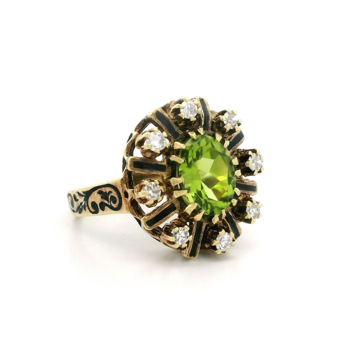 Vintage Yellow Gold 2.28ctw Peridot Diamond Cocktail Ring with Black Enamel: Vintage Yellow Gold 2.28ctw Peridot Diamond Cocktail Ring with Black Enamel This exquisite vintage cocktail ring features a stunning 2.28 carat total weight of natural gemstones. At its center lies an