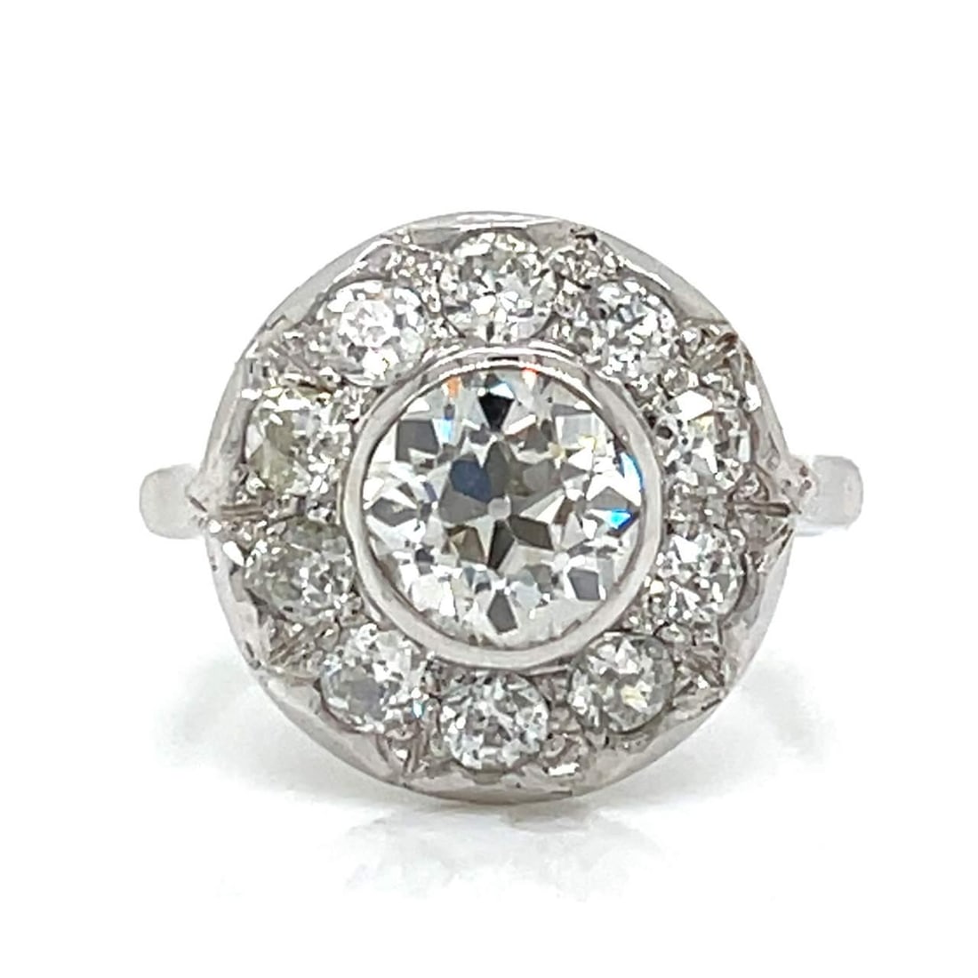 Art Deco 18K White Gold Diamond Ring with 1.25 Ct Center Stone: Art Deco 18K White Gold Diamond Ring with 1.25 Ct Center Stone This stunning Art Deco ring features an exquisite 18K white gold setting adorned with a dazzling center stone--an approximately 1.25 ct E