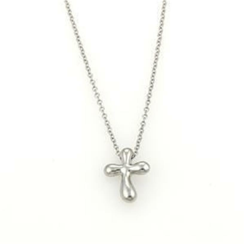Tiffany & Co. Elsa Peretti Mini Cross Platinum Necklace: Tiffany & Co. Elsa Peretti Mini Cross Platinum Necklace This elegant necklace by Tiffany & Co., designed by Elsa Peretti, is expertly crafted from platinum with a fine polished finish. The pendant fea