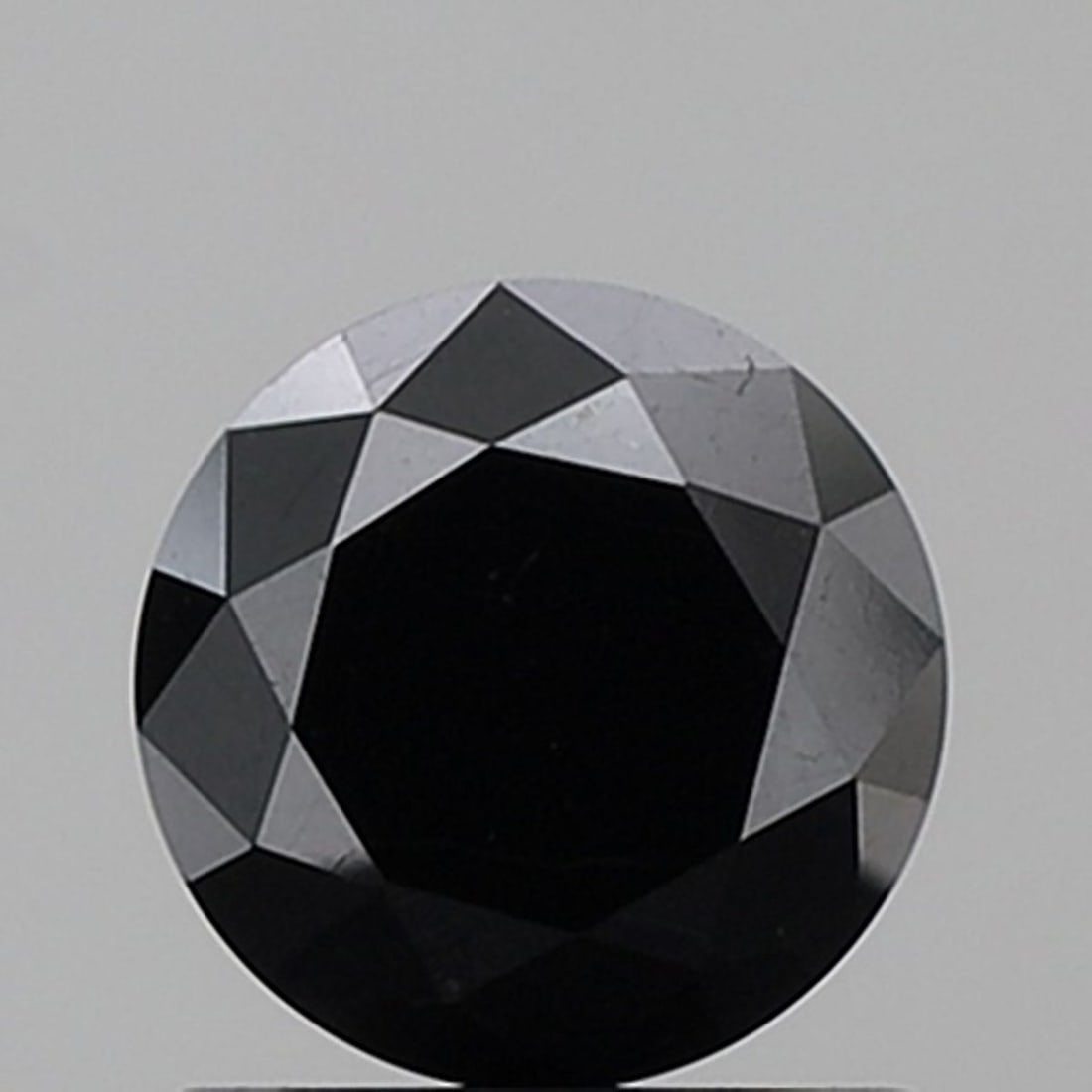 Loose Diamond - ROUND 1.27ct Fancy Black VVS2: Loose Diamond - ROUND 1.27ct Fancy Black VVS2 Source: Natural Shape: ROUND Carats: 1.27 Color: Fancy Black Certification: NONE Video: