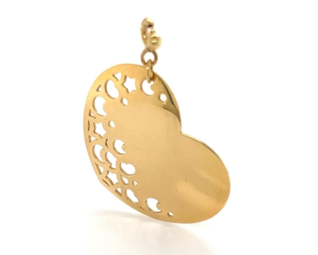 18k Yellow Gold Heart Cutout Pendant by Pasquale Bruni: 18k Yellow Gold Heart Cutout Pendant by Pasquale Bruni This original Pasquale Bruni charm pendant features a cut-out heart design crafted from 18k yellow gold. Signed by the brand, this fine jewelry p