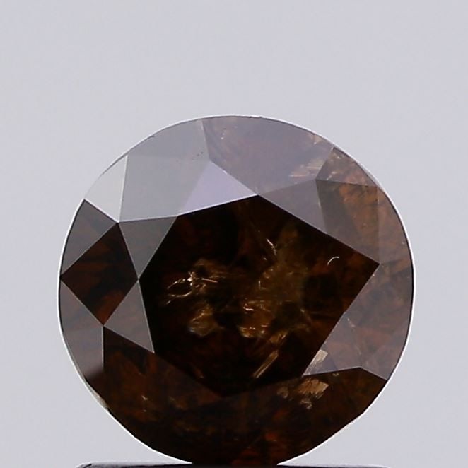 Loose Diamond - ROUND 1.38ct Fancy Brown I3: Loose Diamond - ROUND 1.38ct Fancy Brown I3 Source: Natural Shape: ROUND Carats: 1.38 Color: Fancy Brown Certification: NONE Video:
