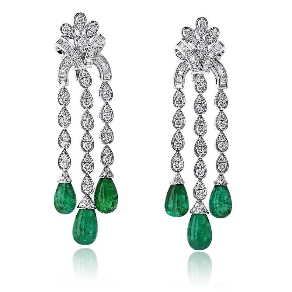 Graff Chandelier Earrings 18K White Gold Diamond Emerald Sugarloaf: Graff Chandelier Earrings 18K White Gold Diamond Emerald Sugarloaf These Graff chandelier earrings are crafted from 18K white gold and feature a striking combination of diamonds and sugarloaf-cut emer
