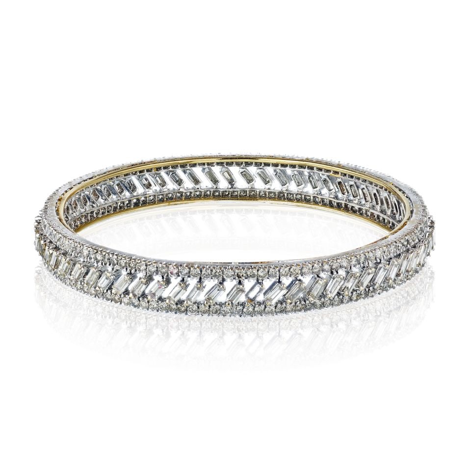 18K White Gold Diamond Bangle Bracelet 7.40cttw Slip On: 18K White Gold Diamond Bangle Bracelet 7.40cttw Slip On This exquisite 18K White Gold Baguette and Round Diamond Slip On Bangle Bracelet is a stunning addition to any jewelry collection. Crafted from