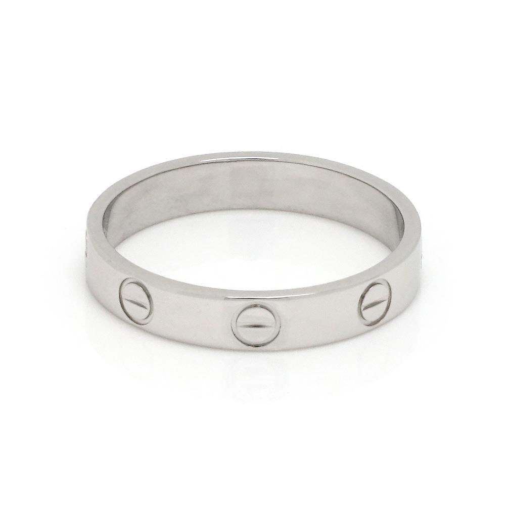 Cartier Love 18k White Gold Band Ring 3.5mm Size 55 US 7.25: Cartier Love 18k White Gold Band Ring 3.5mm Size 55 US 7.25 This exquisite band ring from Cartier's Love collection is crafted from 18k white gold with a polished finish, showcasing the iconic screw m