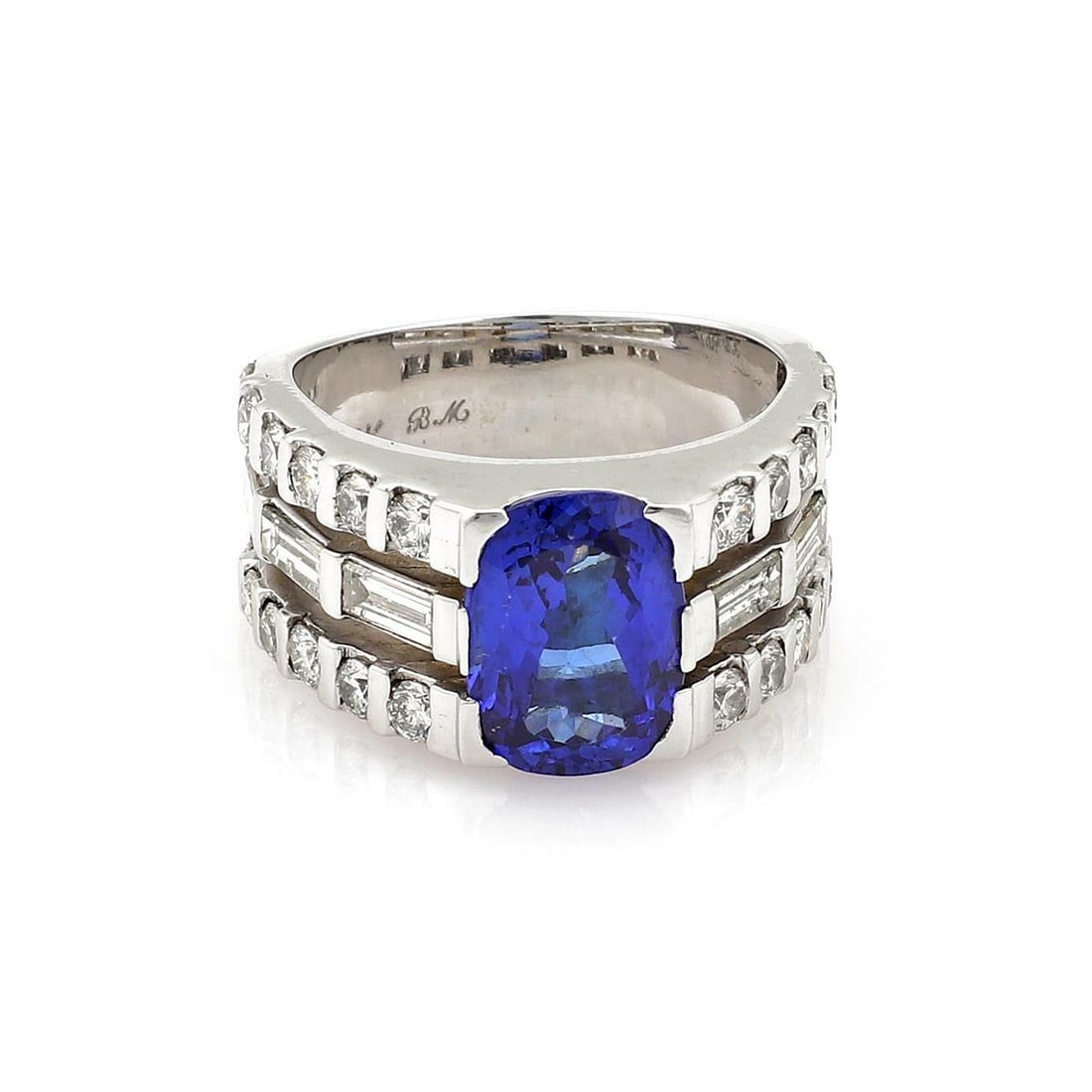 Estate 14k White Gold Tanzanite Diamond Band Ring 6 Carats Size 8.5: Estate 14k White Gold Tanzanite Diamond Band Ring 6 Carats Size 8.5 This exquisite Estate band ring features a striking 3 carat oval cut intense blue tanzanite at its center, complemented by three row