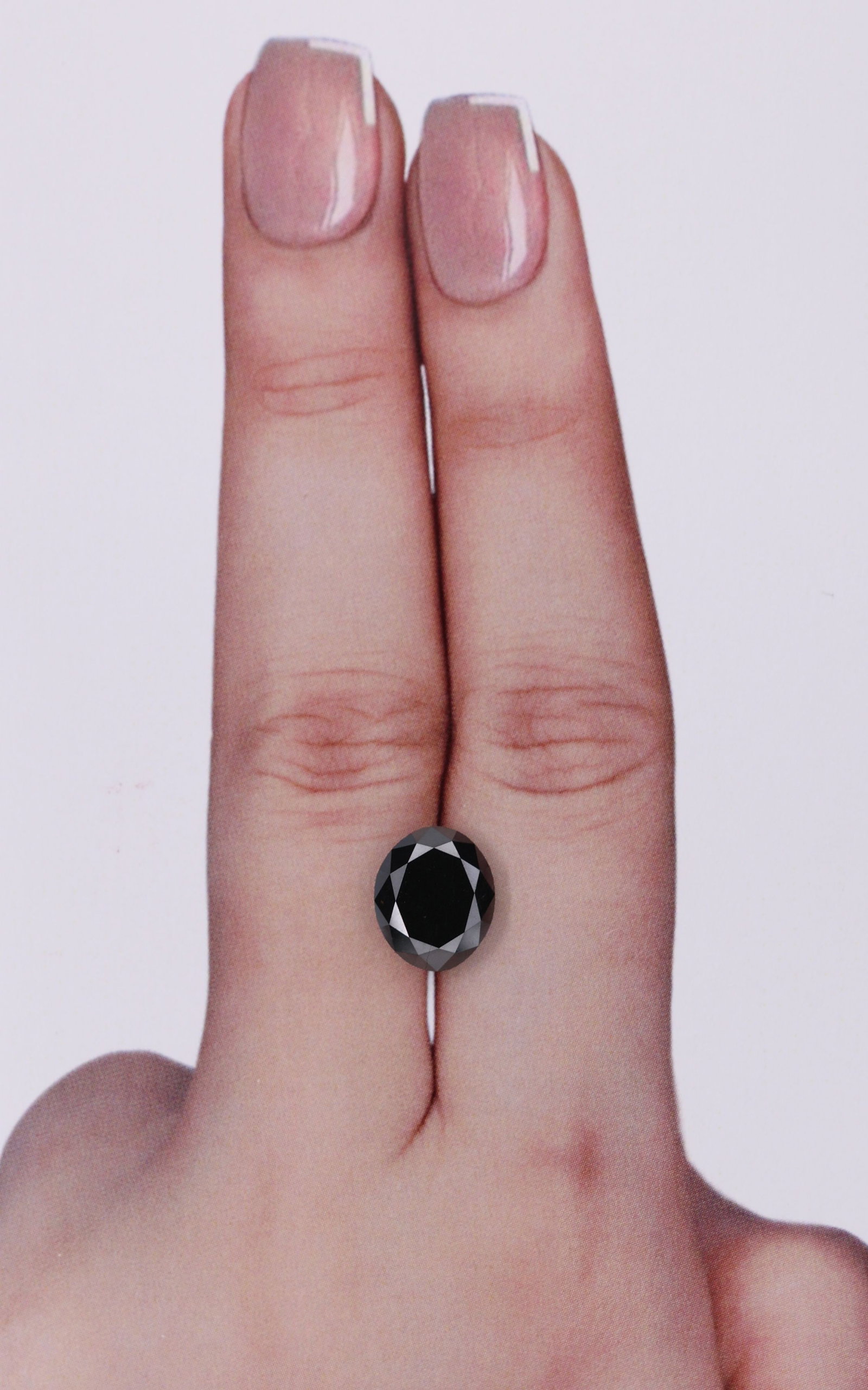 Loose Diamond - OVAL 3.13ct Black: Loose Diamond - OVAL 3.13ct Black Source: Natural Shape: OVAL Carats: 3.13 Color: Black Certification: IGI Video: