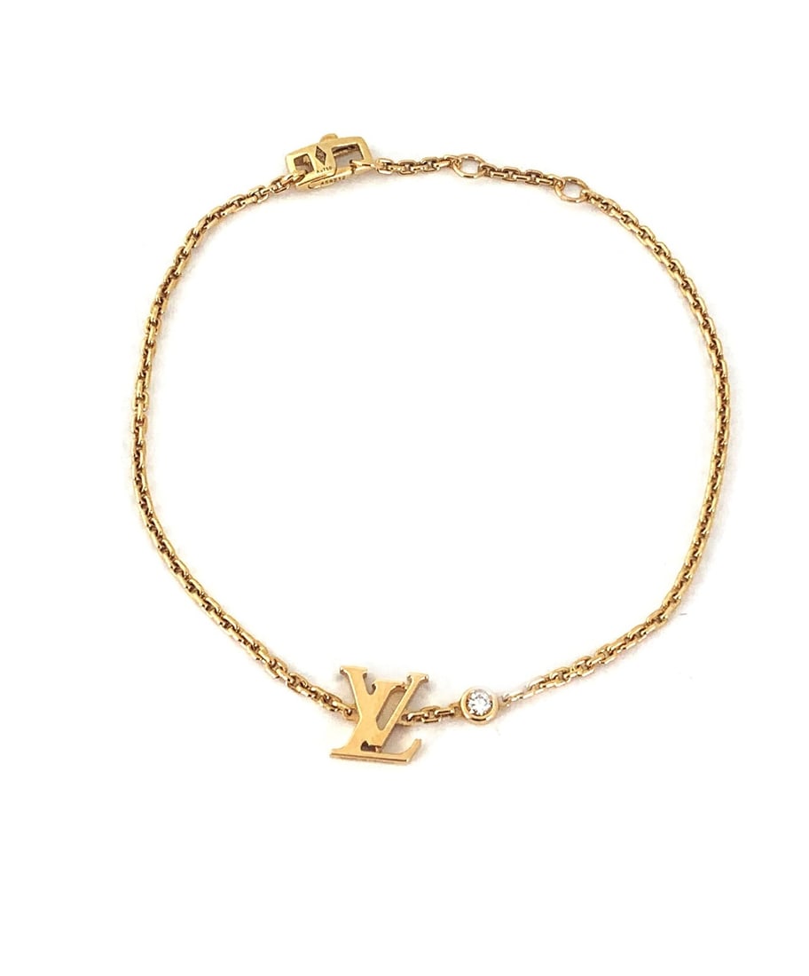 Louis Vuitton Idylle Blossom 18k Yellow Gold Diamond Charm Bracelet: Louis Vuitton Idylle Blossom 18k Yellow Gold Diamond Charm Bracelet This authentic Louis Vuitton Idylle Blossom bracelet is crafted in solid 18k yellow gold featuring a delicate chain and charm design