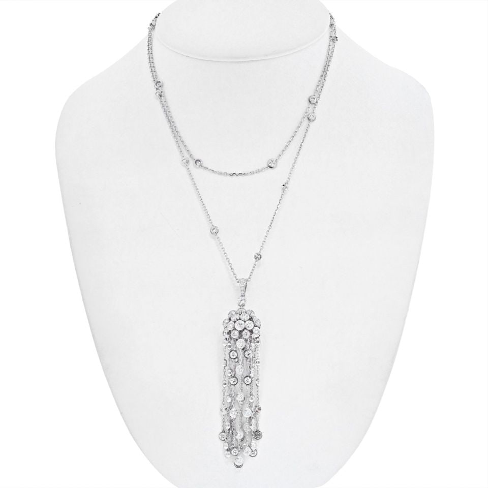 Cartier 18K White Gold L'egers Diamants Necklace with Round Diamonds: Cartier 18K White Gold L'egers Diamants Necklace with Round Diamonds Elevate your elegance with the stunning Cartier 18K White Gold L'egers Diamants Spotlight Necklace. This exquisite piece is crafted