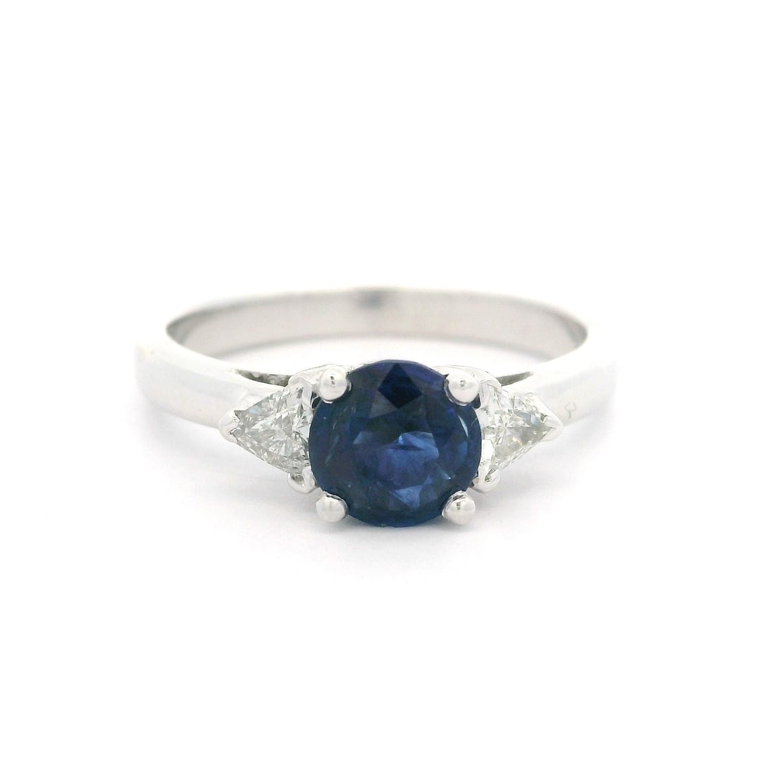Vintage Platinum GIA Certified 1.46ctw Blue Sapphire Diamond Ring: Vintage Platinum GIA Certified 1.46ctw Blue Sapphire Diamond Ring This exquisite vintage ring features a stunning natural genuine round sapphire, weighing 1.10 carats, expertly prong set in solid plat