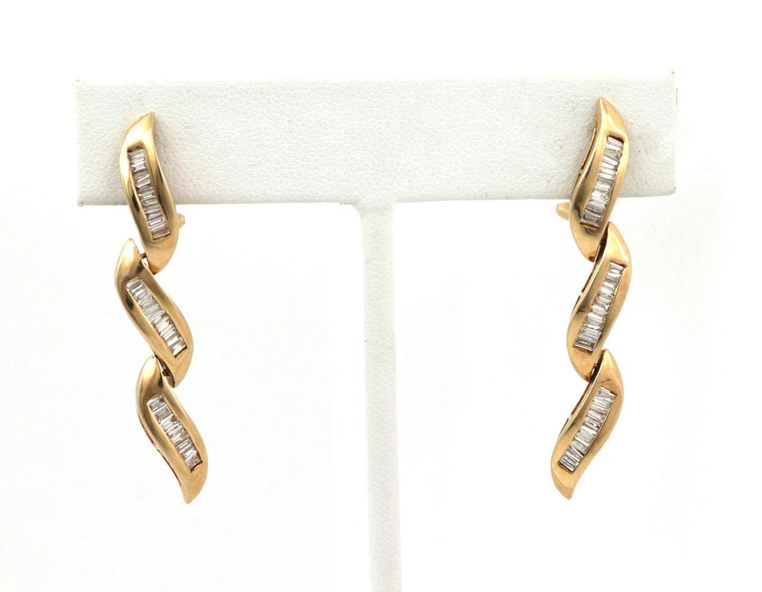 14k Yellow Gold Baguette Diamond 3 Tier Dangle Earrings: 14k Yellow Gold Baguette Diamond 3 Tier Dangle Earrings Elevate your style with these stunning 14k Yellow Gold Baguette Diamonds 3 Tier Drop Dangle Earrings. Crafted from luxurious 14k yellow gold, th