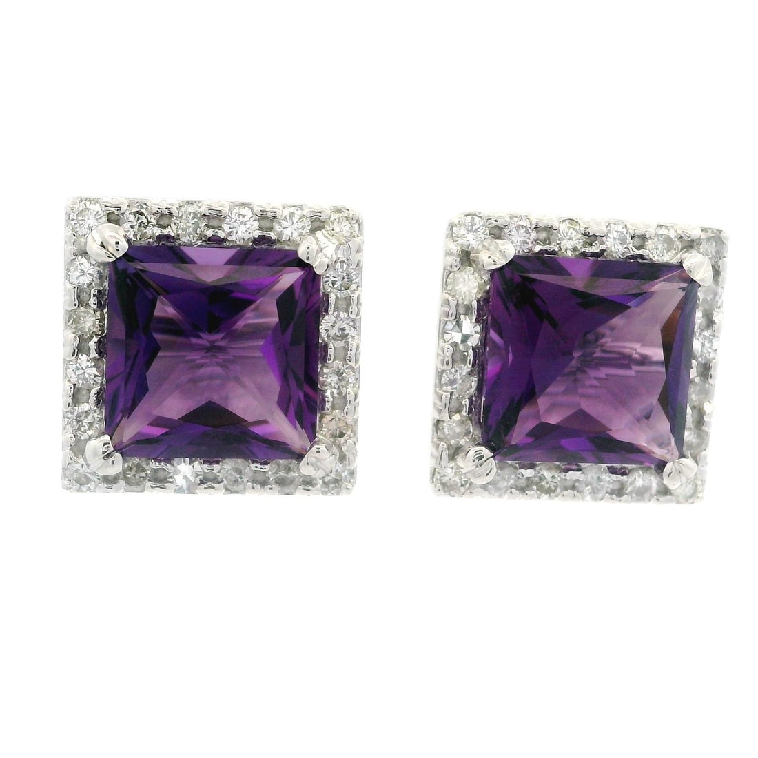 14k White Gold Amethyst Diamond Halo Square Stud Earrings 7.83ctw: 14k White Gold Amethyst Diamond Halo Square Stud Earrings 7.83ctw These stunning large square stud earrings are crafted from 14k white gold and feature a captivating halo design. Each earring showcase